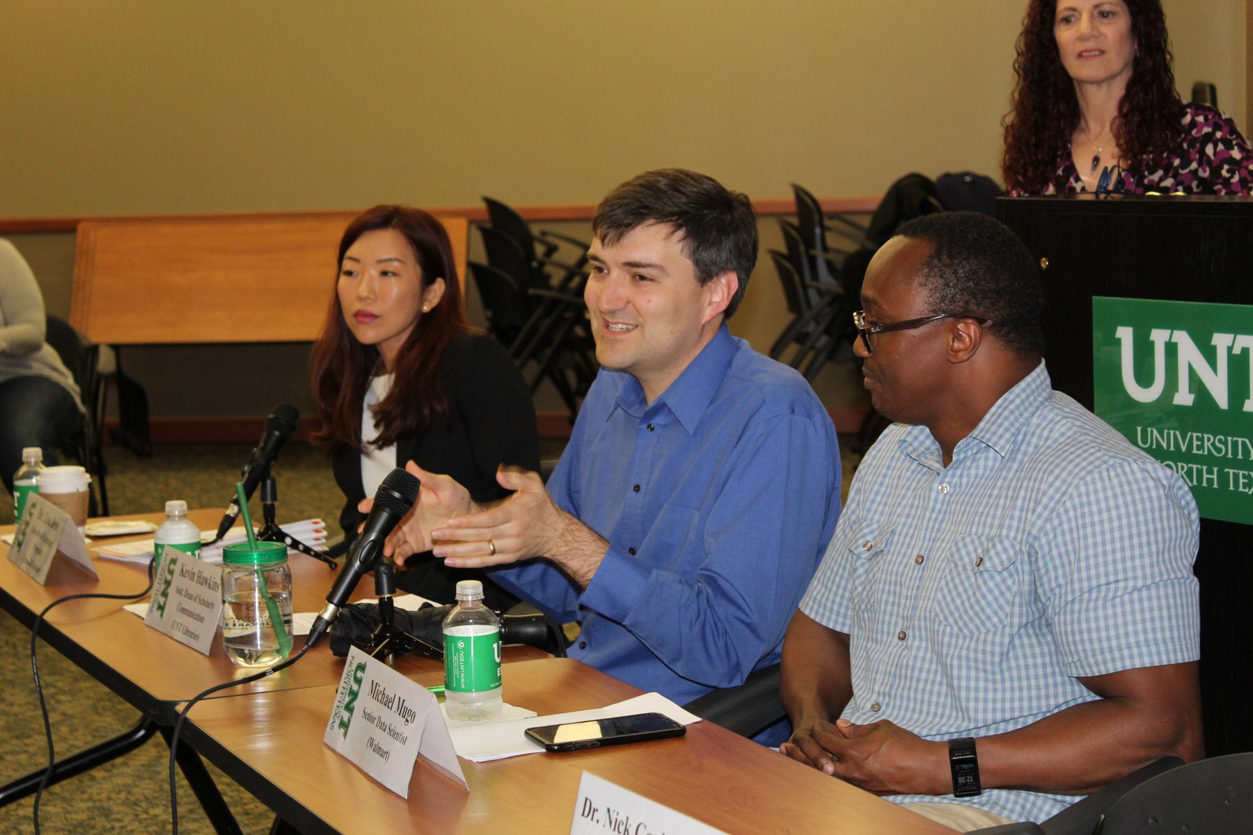 ​​​​Panelists speaking at CODE event